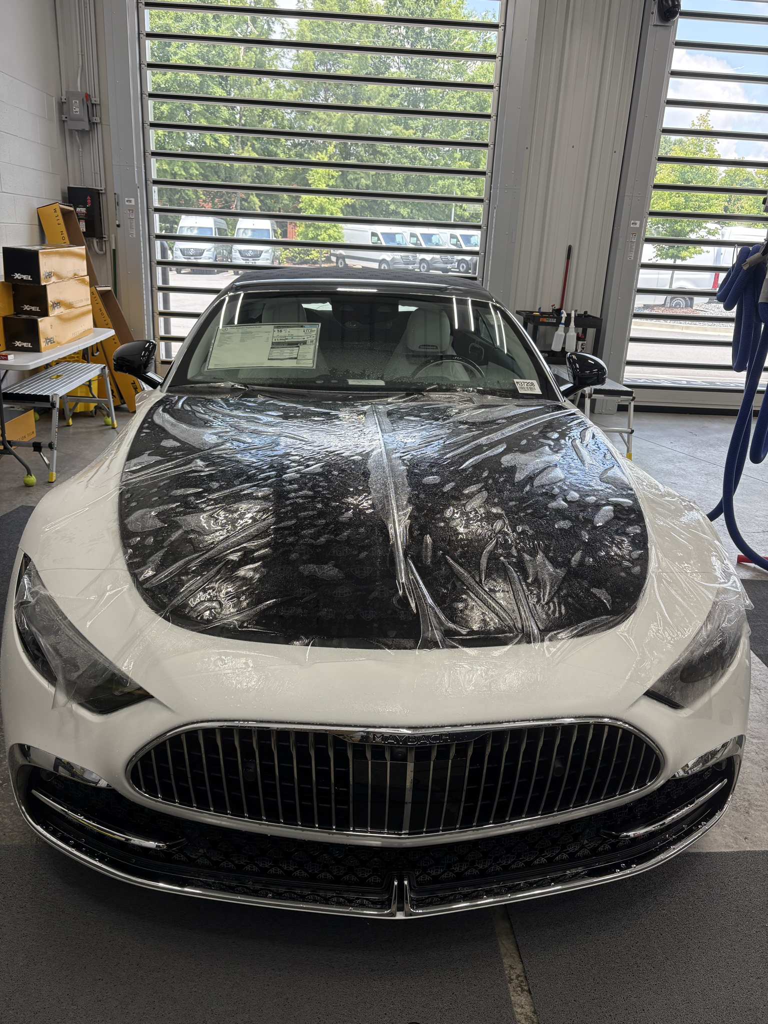 XPEL paint protection film installation on luxury sedan in Atlanta Georgia