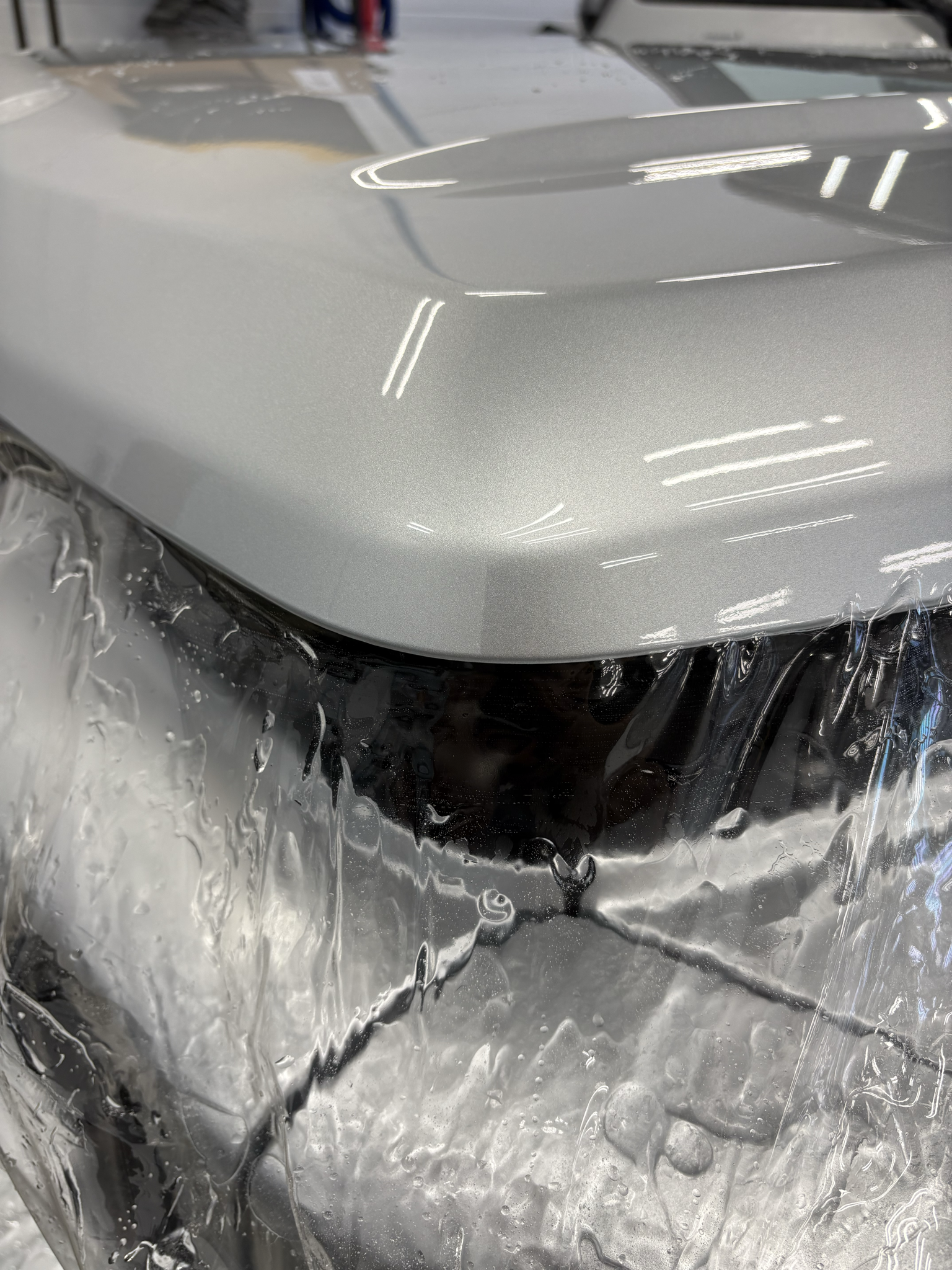 Professional paint protection film wrap on luxury SUV in Atlanta GA