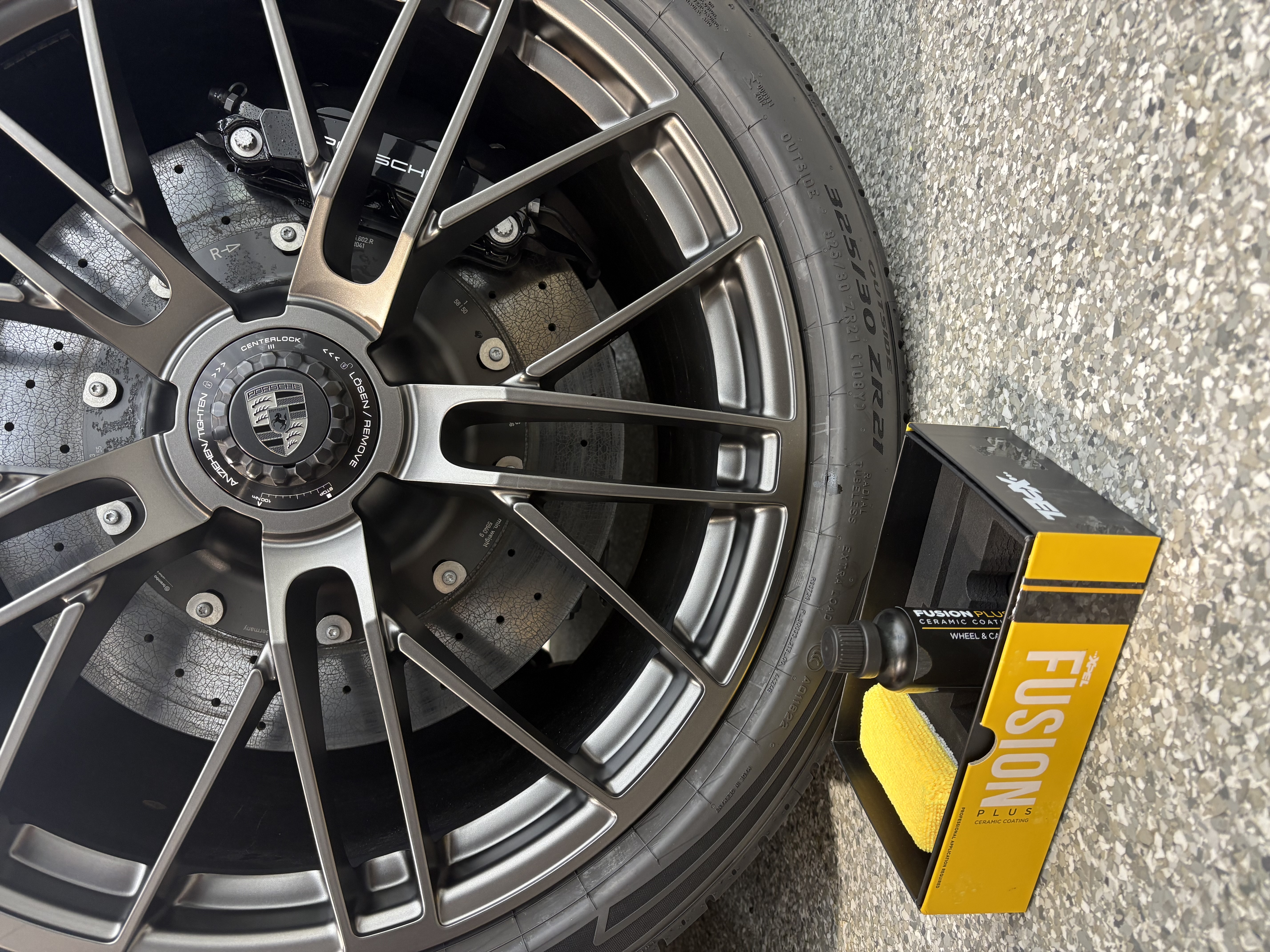 Detailed Porsche wheel and ceramic brake protected with XPEL Fusion Plus in Atlanta Georgia